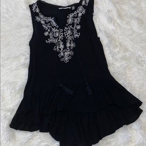 Black blouse with white floral detail